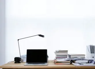 mac book pro on top of table