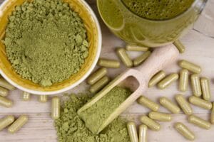 Kratom Mitragyna speciosa powder, capsule and drink